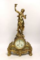 A French figurative gilt metal and green onyx mantel clock with hand painted dial, 51cm high