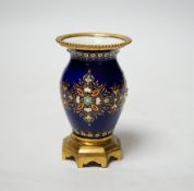 A small 19th century French jewelled blue enamel and ormolu vase, 8cm