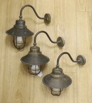 A trio of brass porch lanterns, 38cm high