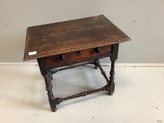 A small 18th century rectangular oak side table with planked top and single frieze drawer, width