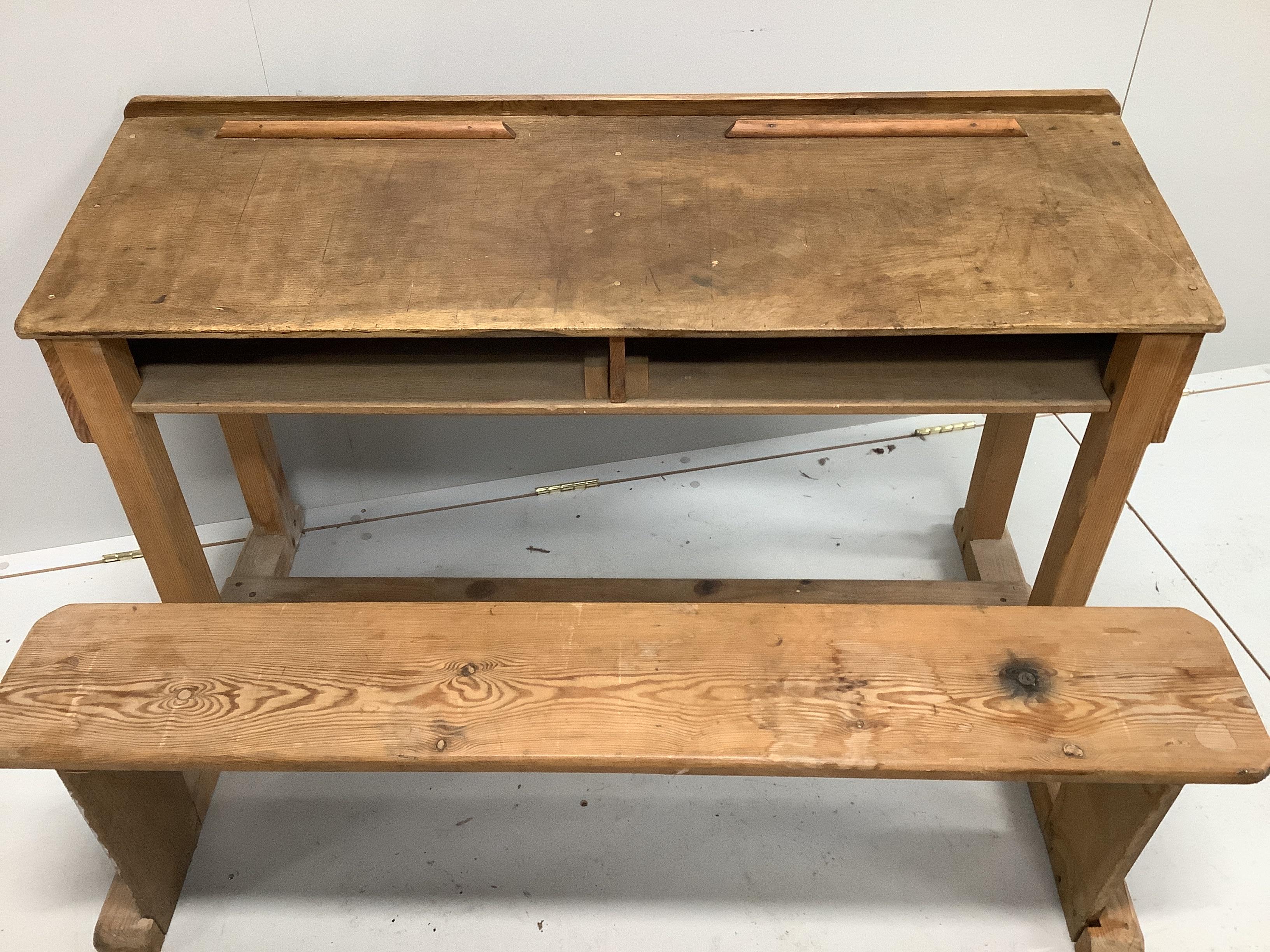 An early 20th century oak and pine child's desk with integral seat, width 120cm, depth 70cm, - Image 2 of 2