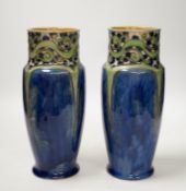 A pair of Royal Doulton Frances E. Pope vases, 25cm