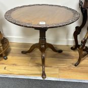 * * A George III mahogany tea table, on a pillar and ‘’bird cage’’ tripod base, (cut down and