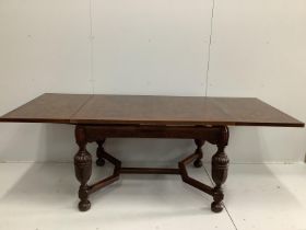 A Jacobean Revival parquetry inlaid rectangular oak draw leaf dining table, 220cm extended, depth