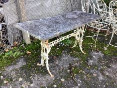 A Victorian cast iron table garden table with weathered marble top, width 139cm, height 71cm