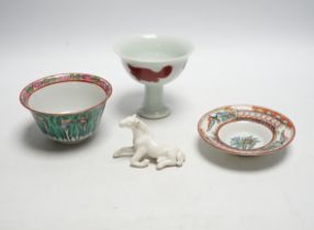 A Chinese tea bowl and stand, a white glazed horse and a pedestal bowl, tallest 9cm high