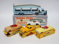 Five boxed Dinky Toys; (132) a Packard Convertible, (131) a Cadillac Tourer, (133) a Cunningham C-5R