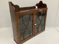 A George III style glazed mahogany wall cabinet, width 77cm, depth 20cm, height 72cm