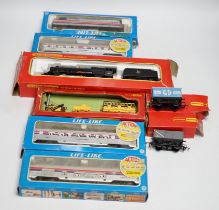 Eight items of 00 and HO gauge model, railway, including; a Tri-ang Stevenson’s Rocket set (R346), a