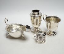 * * Four pieces of George V silver:- a sauceboat, a mustard pot, a vase and a cup. Please note