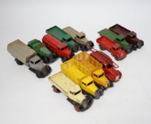 Twenty-five Dinky Toys and Atlas Dinky including a few pre-war examples; Delivery lorries, Market