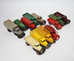 Twenty-five Dinky Toys and Atlas Dinky including a few pre-war examples; Delivery lorries, Market