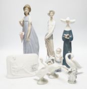 Twelve Lladro figures including a dog and three ducks, a plaque and two cups together ith three