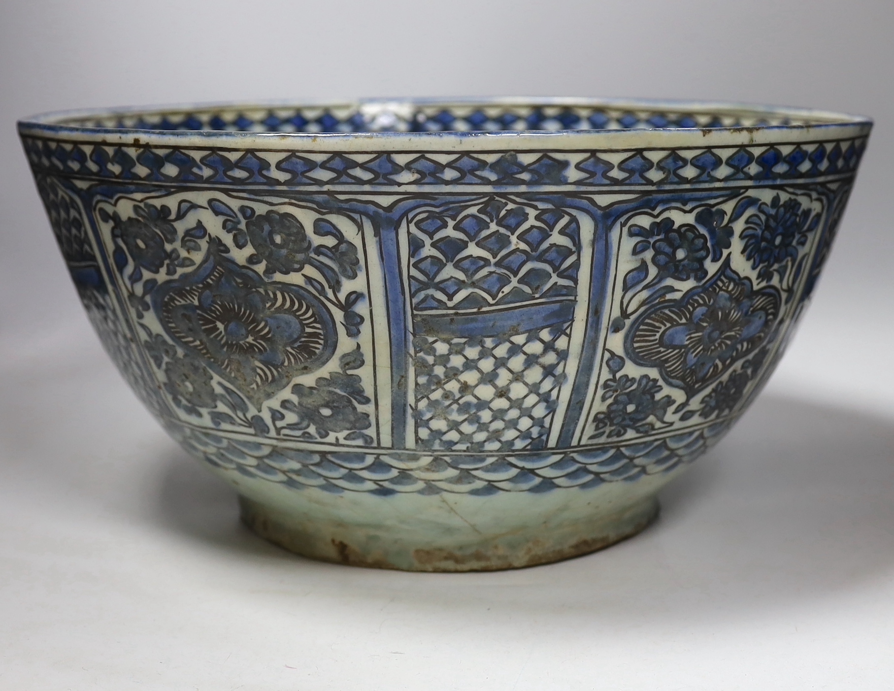 A large Persian underglaze blue and black fritware bowl, Safavid, 17th/18th century 40cm diameter, - Image 2 of 4