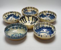 A group of six slipware pottery bowls, 16cm