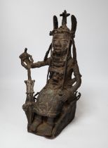 A 19th century Benin bronze of a seated figure, 38cm high