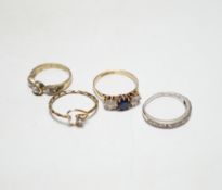 Two 9ct and gem set rings, including diamond chip half eternity and two other rings.