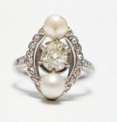 A white metal single stone diamond and two stone cultured pearl set oval ring, with diamond chip set