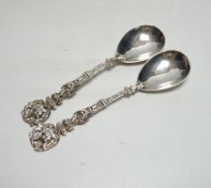 * * A pair of Victorian silver serving spoons, with figural handles and phoenix terminals, Charles