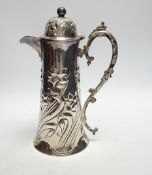 * * A late Victorian embossed silver jug, John Henry Potter, Sheffield, 1900, height 24.8cm, with