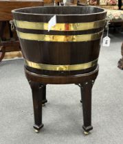 A George III triple brass bound mahogany wine cooler, on a detachable stand, width 48cm, depth 38cm,