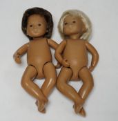 Two small Sasha dolls