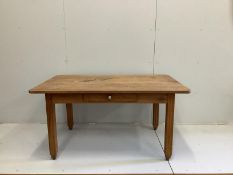 An early 20th century French fruitwood kitchen table with one drawer, width 149cm, depth 95cm,