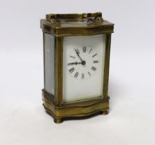 A brass carriage timepiece 12cm high