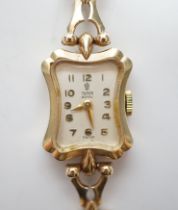 A lady's late 1960's 9ct gold Tudor Royal manual wind wrist watch, on an associated 9ct gold