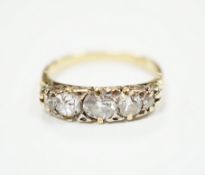 An 18ct and graduated five stone diamond set half hoop ring, size L, gross weight 2.8 grams (