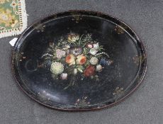 A large Victorian oval papier mache tray hand painted with flowers, 73cm wide