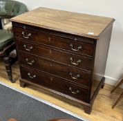 * * A George III mahogany straight front chest, fitted four long drawers with slide, width 87cms,