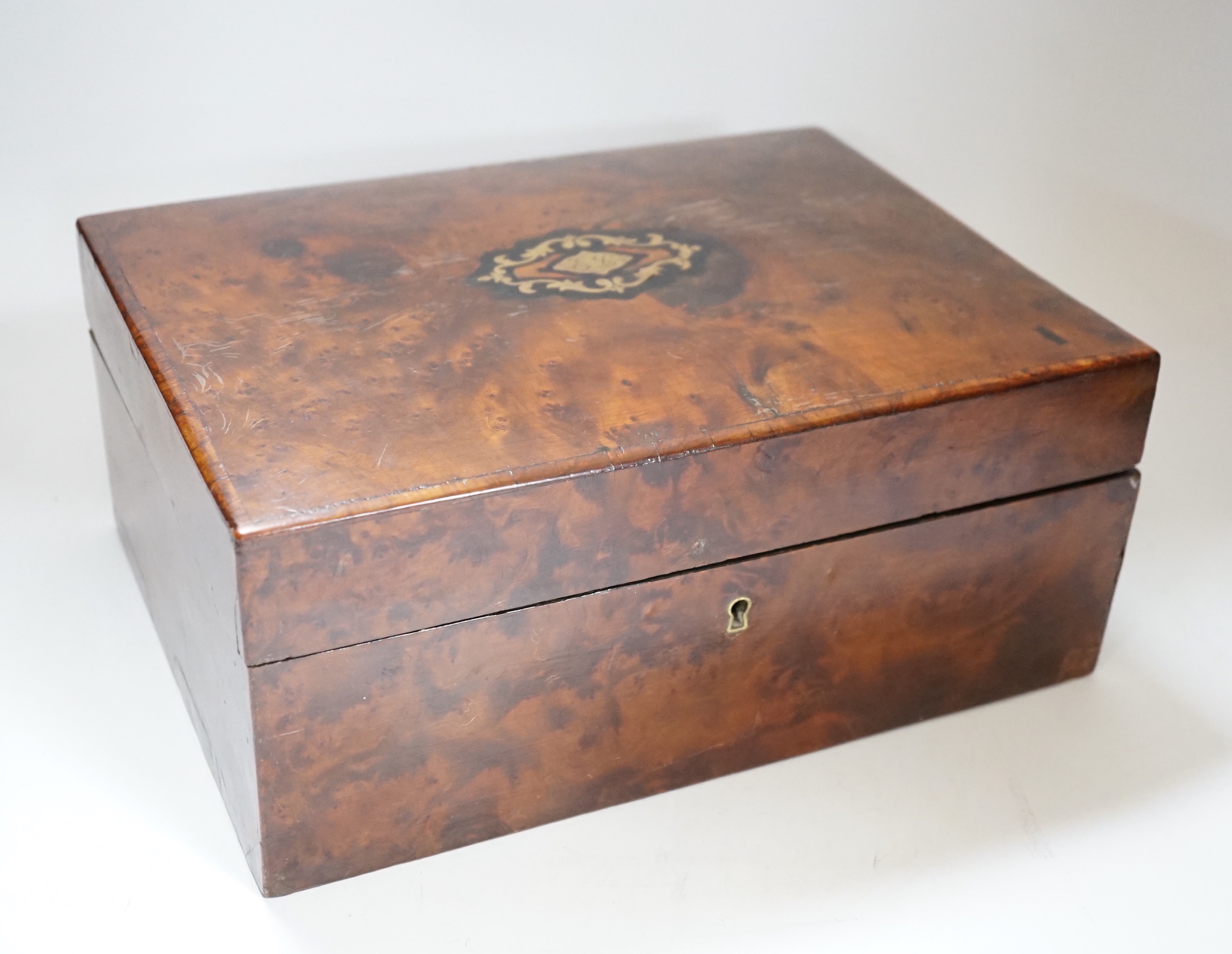 A Late 19th century burr yew and brass inlaid jewellery box, with lift out compartment and key, 28cm