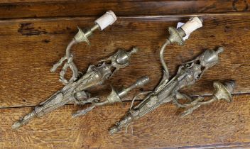 A pair of Louis XVI style bronze two branch swagged wall sconces, 39cm high