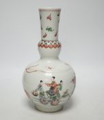 A Chinese famille verte bottle vase, Kangxi mark but later, 22cm