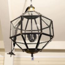 A pair of contemporary bronzed and black painted octagonal lanterns, 64cm wide, 90cm high