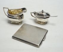 * * A George VI engine turned silver cigarette case, a silver lidded mustard pot and a small
