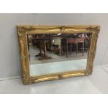 A Victorian style rectangular gilt composition wall mirror, width 109cm, height 79cm