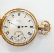 A gold plated Waltham half hunter keyless pocket watch, with Roman dial and subsidiary seconds.