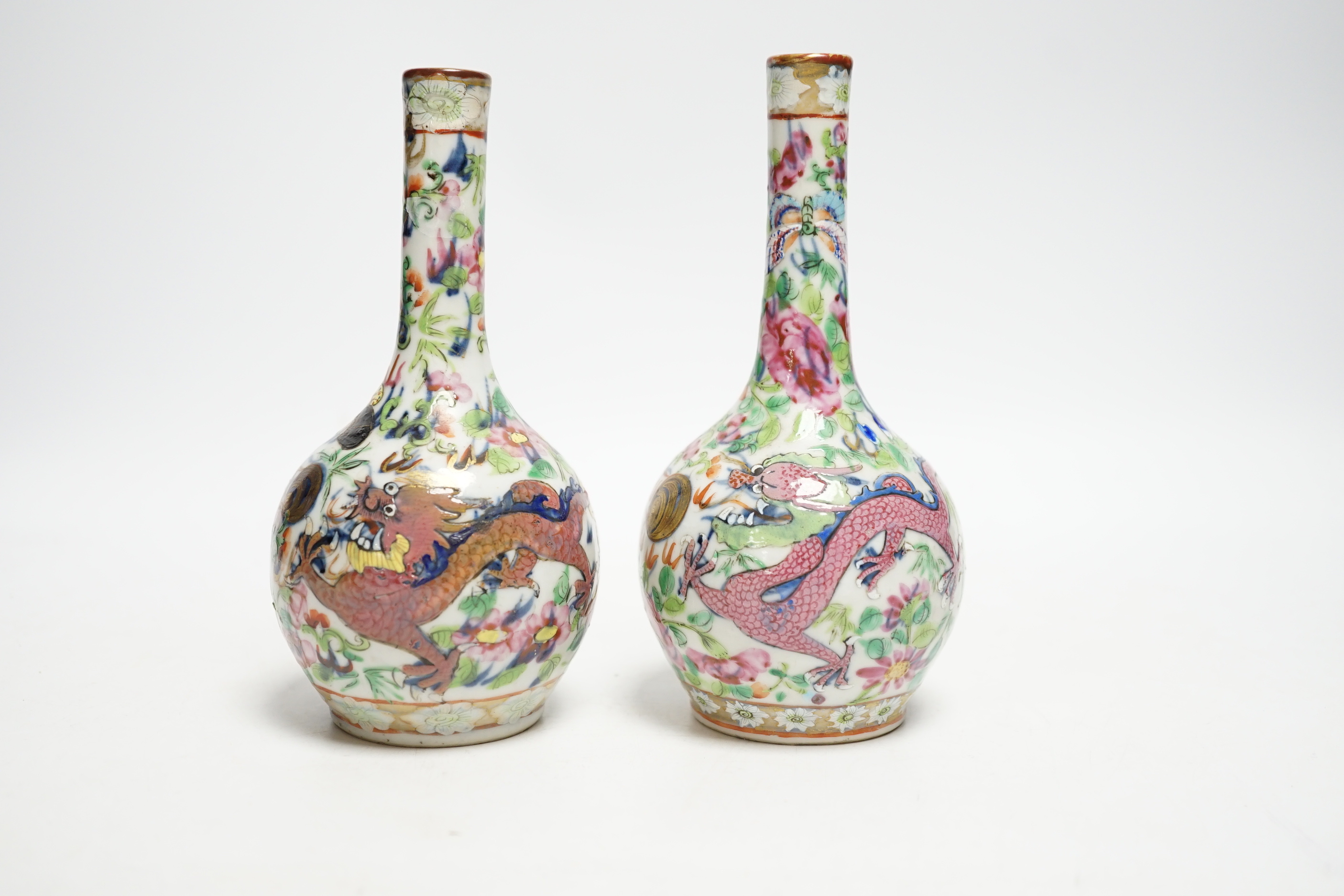 A pair of 19th century Chinese clobbered famille rose 'dragon' bottle vases, 15.5cm - Image 3 of 5