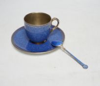 A cased Worcester powder blue and silvered coffee set with enamelled silver spoons together with a