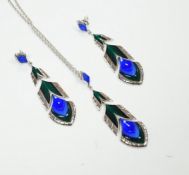 A modern Lalique 925, enamel and glass set pendant necklace, 66cm and a pair of matching earrings.