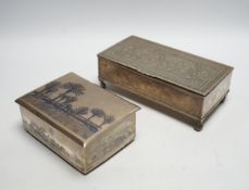 A Persian engraved white metal rectangular cigarette box and a similar white metal and niello