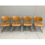 Four mid century 'Howe' bent ply and chrome stacking chairs