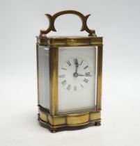 A brass cased carriage timepiece, 12cm