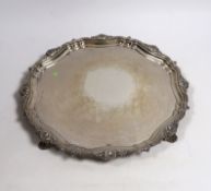 * * An Elizabeth II silver circular salver, Walker & Hall, Sheffield, 1957, 32cm, 30oz. Please