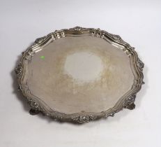 * * An Elizabeth II silver circular salver, Walker & Hall, Sheffield, 1957, 32cm, 30oz. Please