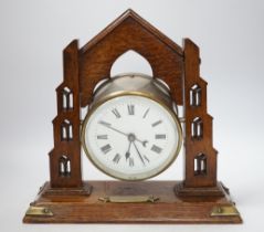 A G.P.O. timepiece and oak stand, 30cm wide