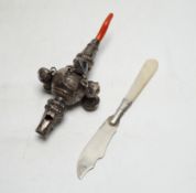 A late Victorian silver baby rattle, with coral teether, by George Unite, 11.6cm and a small