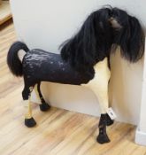 A wood and skin-covered model pony, height 75cm